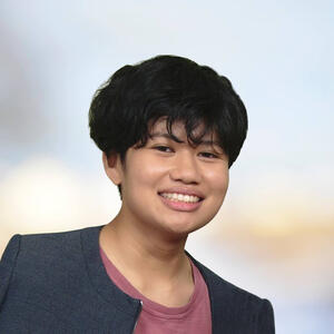 Headshot of MK Alova